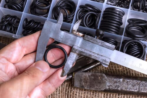 Measuring The Diameter Of The Rubber Ring With A Caliper.